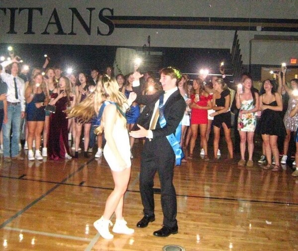 Homecoming Queen, Meredith Crawley (12), and Homecoming King, Jack Barbour (12), dance together.