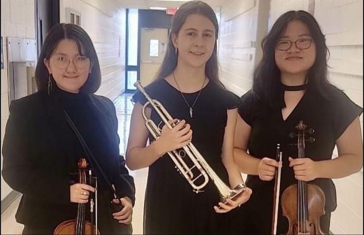 Julia P., Meribel P., and Julia L. participate in the southern-central regional orchestra!